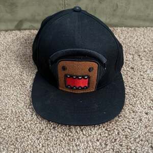 Domo-kun Black Snapback Hat with Fuzzy Character Face Wearing Headphones